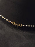 Elegant Pearl Chain & Bow Accent